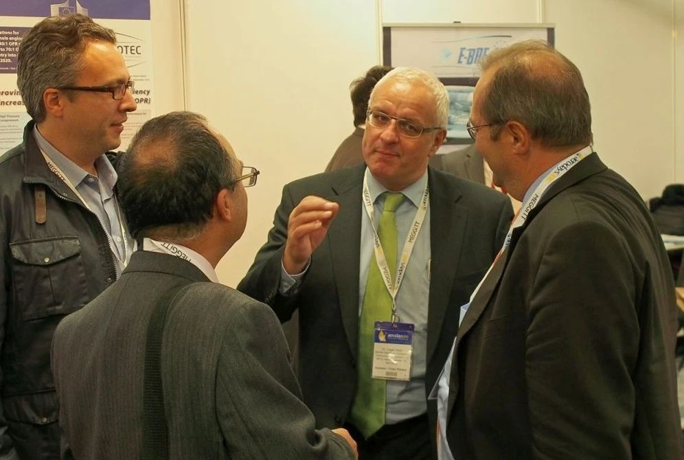 ENOVAL Coordinator Dr. Merkl discussing with visitors